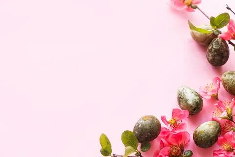 Easter flat lay. Stylish easter eggs and red flowers on pink background. Ea.. Stock Photos