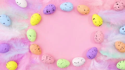 Easter frame with eggs and feather. Stop motion Stock Footage 147738304