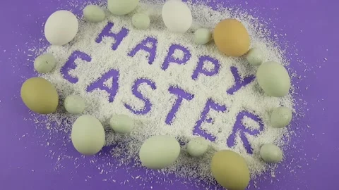 Easter frame with eggs and feathers on a blue wooden background. Top view. Card Stock Footage 172198993