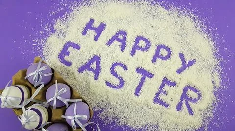 Easter frame with eggs and feathers on a blue wooden background. Top view. Ca Stock Photos