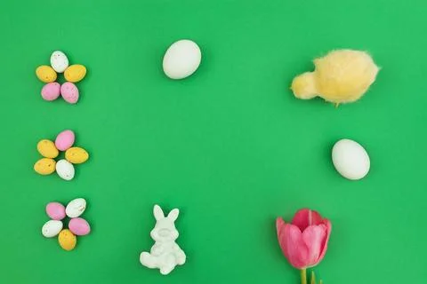 Easter frame with eggs, bunny, pink tulip Stock Photos