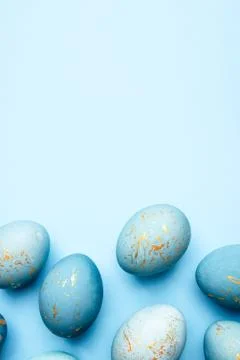 Easter frame of eggs painted in blue color. Stock Photos