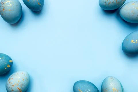 Easter frame of eggs painted in blue color. Stock Photos