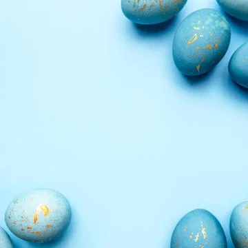 Easter frame of eggs painted in blue color. Stock Photos