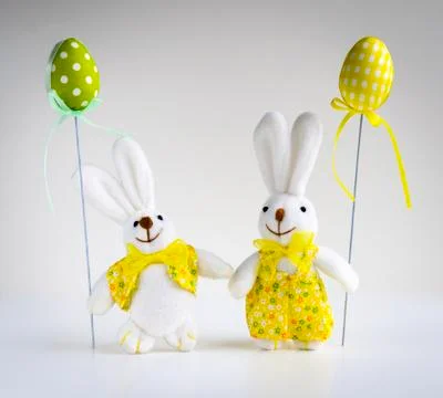 Easter funny bunnies with eggs Stock Photos