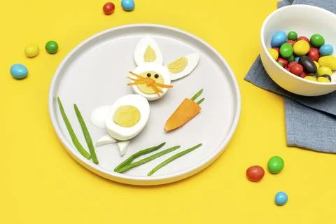 Easter Funny Creative Healthy breakfast lunch food idea for kids children. Bu Stock Photos