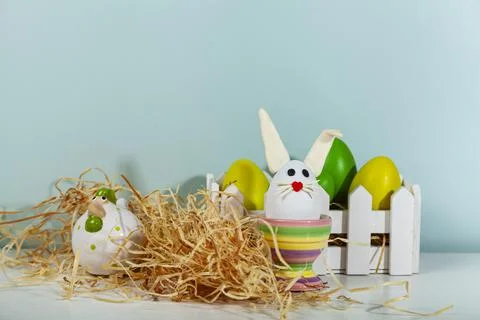 Easter greeting card. Easter egg with bunny ears on a stand. Stock Photos