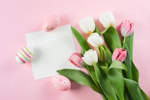 Easter Greeting card. White empty blank for text, easter eggs and white pin.. Stock Photos