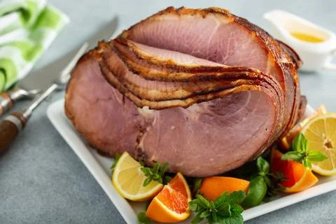 Easter ham on the table Stock Photos