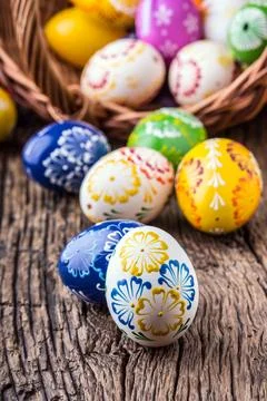 Easter. Hand made easter eggs on old wooden table Stock Photos