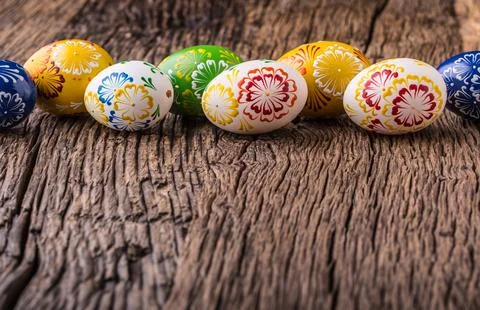 Easter. Hand made easter eggs on old wooden table Stock Photos