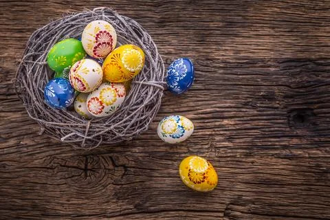 Easter. Hand made easter eggs on old wooden table Stock Photos