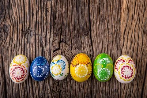 Easter. Hand made easter eggs on old wooden table Stock Photos