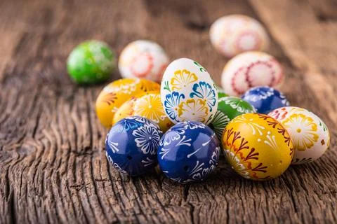 Easter. Hand made easter eggs on old wooden table Stock Photos