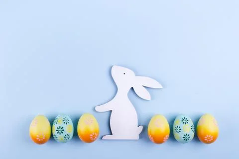 Easter holiday background with eggs. Top view of colorful painted chicken egg Stock Photos