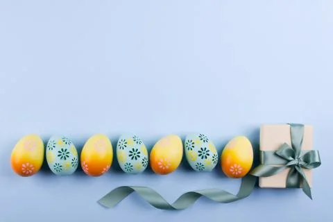 Easter holiday background with eggs. Top view of colorful painted chicken egg Stock Photos