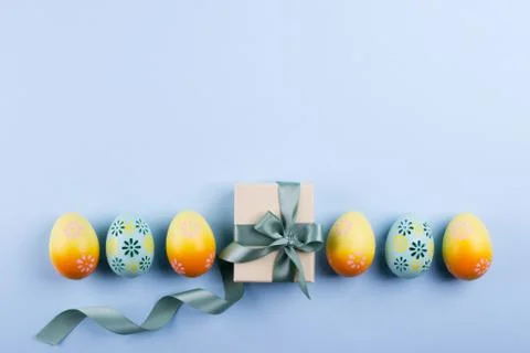 Easter holiday background with eggs. Top view of colorful painted chicken egg Stock Photos
