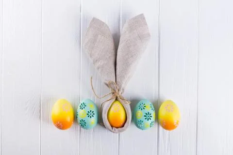 Easter holiday background with eggs. Top view of colorful painted chicken egg Stock Photos