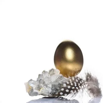 Easter holiday concept background with clear quartz gemstone Stock Photos