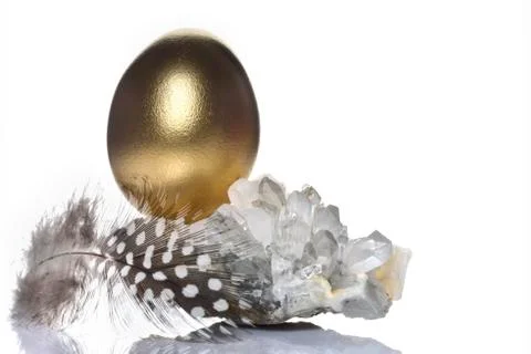 Easter holiday concept background with clear quartz gemstone Stock Photos