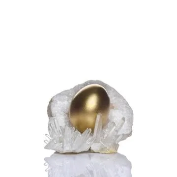 Easter holiday concept background with clear quartz gemstone Stock Photos