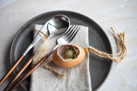  Easter holiday concept Festive table setting for easter dinner on white w... Foto stock