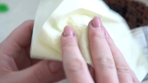 Easter holiday. egg coloring. egg in color patterns in the hand. multi-colored. Stock-Footage 127957570