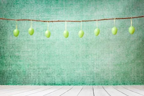 Easter holiday eggs hanging on a string Stock Photos