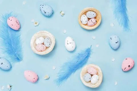 Easter Holiday Invitation Design with Easter Eggs and Feathers Stock Photos