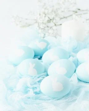 Easter. Holiday. Light white background, gentle pastel colors. Flowers in Stock Photos