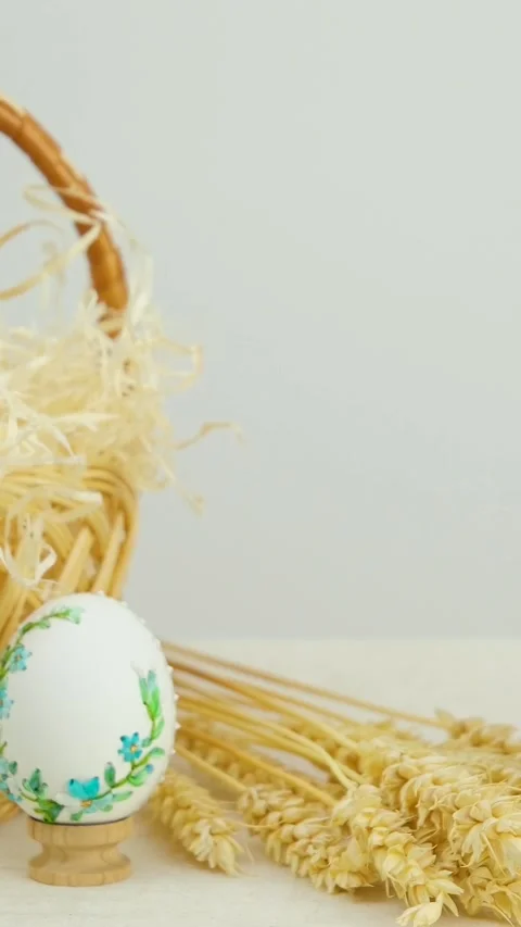 Easter holiday phone with white background basket eggs with embroidered pattern Stock Footage 249112637