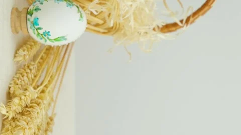 Easter holiday phone with white background basket eggs with embroidered pattern Stock Footage 274715769