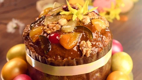 Easter holiday scene. Traditional Easter cake and colorful painted eggs Stock Footage 86484216