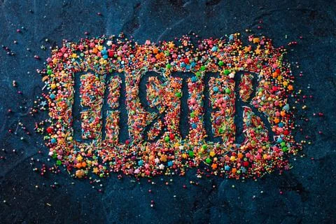 Easter holiday sugar sprinkling background top view Stock Photos