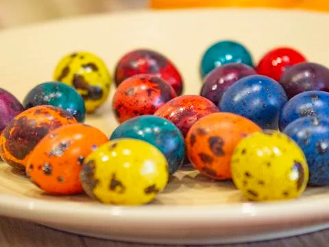 Easter holiday.colored eggs are on the table at the time of painting Stock Photos