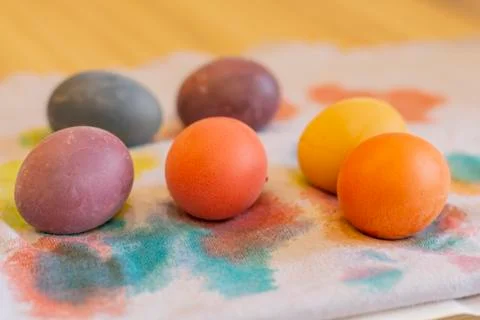 Easter holiday.colored eggs are on the table at the time of painting Stock Photos