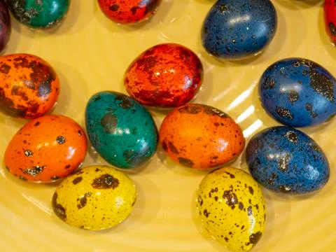 Easter holiday.colored eggs are on the table at the time of painting Stock Photos