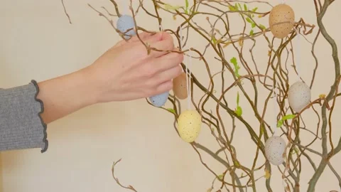  Easter, holidays and people concept. Easter tree on yellow background Stock Footage 149113579