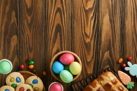 Easter hot cross buns with colored eggs Easter gingerbread rabbits and cook.. Stock Photos