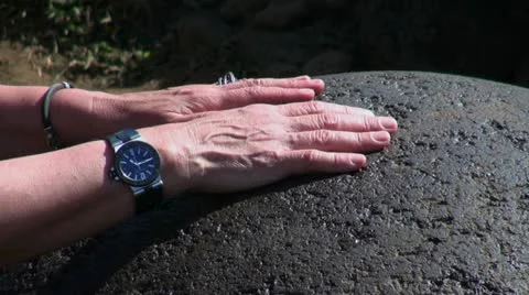 Easter Island hands on Navel of the World 2 Stock Footage