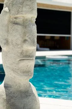 Easter Island Statue Poolside Stock Photos