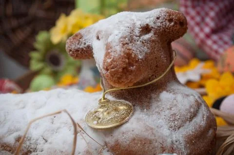 Easter lamb in cake with icing sugar with easter decoration Stock Photos