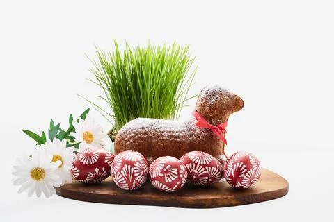 Easter lamb cake with red eggs and green grass Stock Photos
