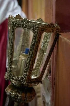 Easter lantern leaning on the wall Stock Photos