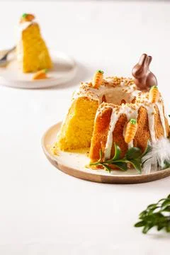 Easter lemon cake with icing and easter decoration. Easter gugelhupf cake wit Stock Photos