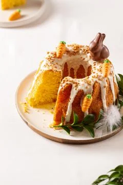 Easter lemon cake with icing and easter decoration. Easter gugelhupf cake wit Stock Photos