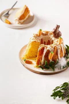 Easter lemon cake with icing and easter decoration. Easter gugelhupf cake wit Stock Photos