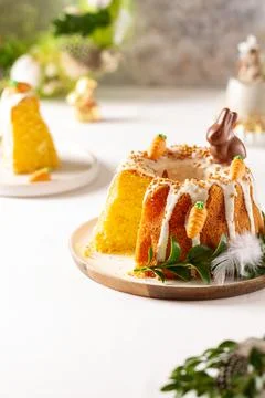 Easter lemon cake with icing and easter decoration. Easter gugelhupf cake wit Stock Photos