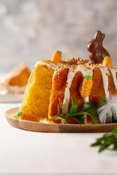 Easter lemon cake with icing and easter decoration. Easter gugelhupf cake wit Stock Photos