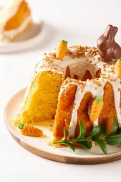Easter lemon cake with icing and easter decoration. Easter gugelhupf cake wit Stock Photos